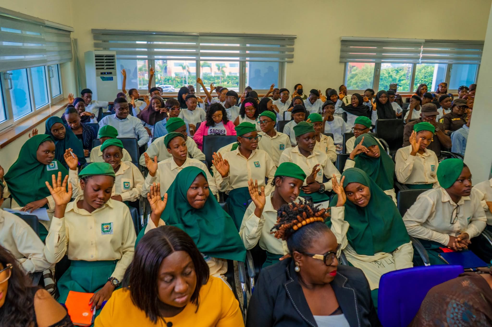 Students at a Flow With Pride Menstrual Health Society session in Abuja